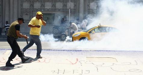 Tunisia imposes curfew at night as unrest grows